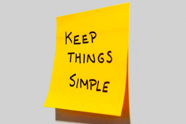 Yellow post it note that says "Keep things simple"