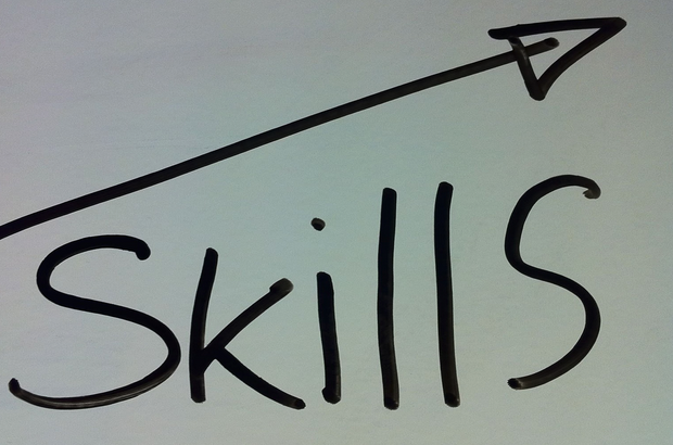 Writing on a paper saying "Skills"