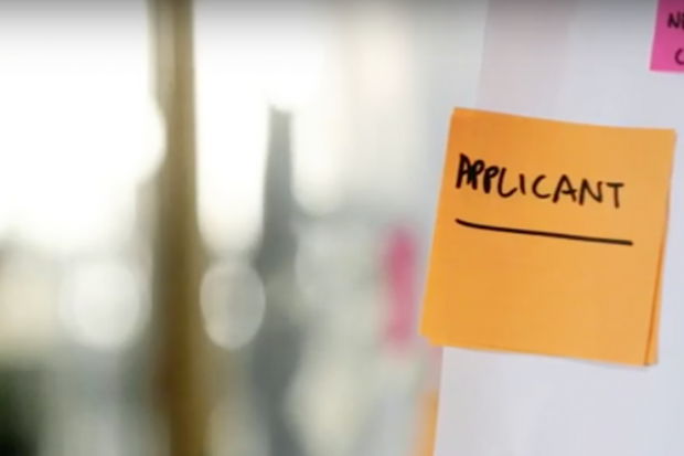 Post-it note with "Applicant" written on it