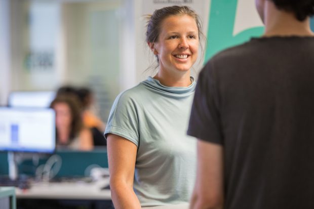 Dr. Joanna Lee, talking to a colleague