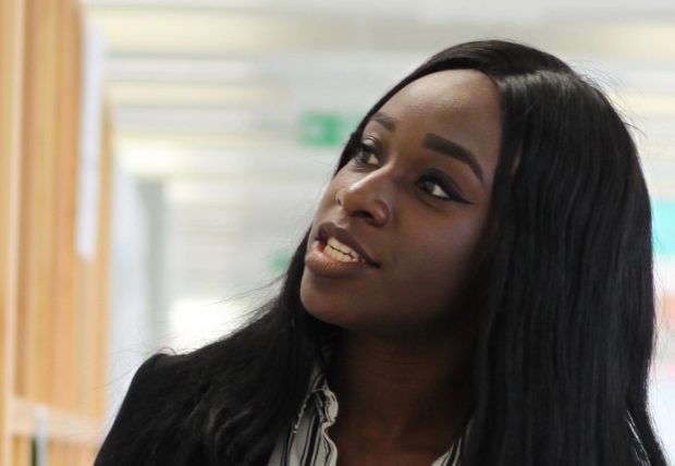 An intern looking away from the camera talking