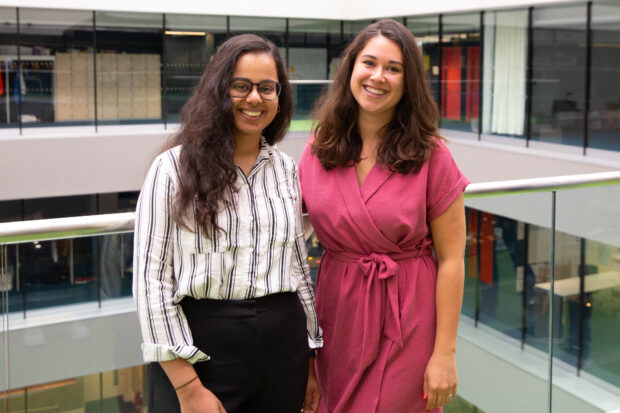 Avanika and Jennifer facing the camera and smiling 