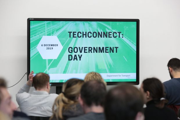 A screen that reads "6 December 2019. TechConnect: Government Day. Department for Transport."