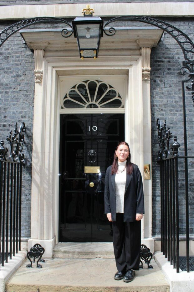 Photograph of Amelia outside 10 Downing Street