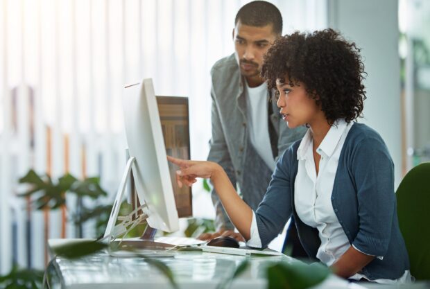 Stock image of people working in an office
